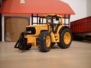 John Deere 6620 in Gelb